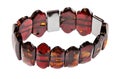 Bracelet from polished amber pieces isolated Royalty Free Stock Photo