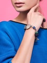 The bracelet on the wrist of a young woman. Wrist handmade bracelets Royalty Free Stock Photo