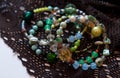 Bracelets made of glass beads on brown textured fabric