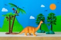 Brachiosaurus dinosaur toy model on wild models background