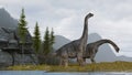 Brachiosaurus near a mountain lake . Royalty Free Stock Photo