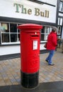 A traditional red King George Post Box in England