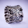 Braclet with gems on color background Royalty Free Stock Photo