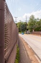 Braddock Hills, Pennsylvania, USA 9/10/20 A chain link fence running along the Brinton Road bridge