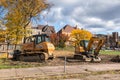 Braddock, Pennsylvania, USA November 1, 2023 Two Case construction equipment machines, a bulldozer and an excavator