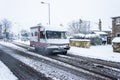 Bradford on Avon, UK, February 1st 2019: A Hymer campervan driving through snowy conditions