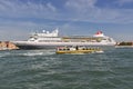 Braemar cruise ship and water bus in Venice lagoon, Italy.