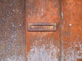 BRAGANZA, PORTUGAL - April 02, 2022: Vintage rusted metallic post box in Braganza, Portugal. Post inscription in