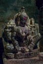 Brahma Jinalaya temple. Closeup of damaged black stone statue of Padmavati.Lakkundi