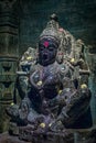 Brahma Jinalaya temple. Closeup of damaged black stone statue of Padmavati.Lakkundi