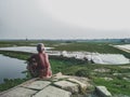 BrahmanbThe farmer watching his land and Water pumping at agriculture field