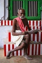 Brahmin smiling in a traditional outfit