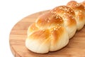 Braid from the bakery on a kitchen wooden board Royalty Free Stock Photo