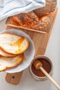 Braided Challah bread and honey Royalty Free Stock Photo