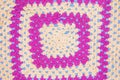 Braided colored woollen mat. Image of crochet woollen blanket background Royalty Free Stock Photo