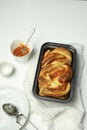 Braided or roll bread. Babka or brioche bread with apricot jam. Royalty Free Stock Photo