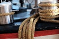 Braided ropes tied to steel bollards Royalty Free Stock Photo