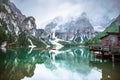 Braies lake and boats in mountain in Dolomites