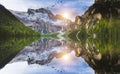 Hut on Braies Lake in Dolomiti mountains and Seeko. Royalty Free Stock Photo