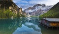 Hut on Braies Lake in Dolomiti mountains and Seeko. Royalty Free Stock Photo