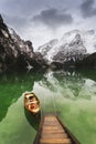 Hut on Braies Lake in Dolomiti mountains and Seeko. Royalty Free Stock Photo