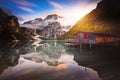 Hut on Braies Lake in Dolomiti mountains and Seeko. Royalty Free Stock Photo