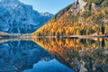 Braies lake at sunrise in autumn in Dolomites, Italy Royalty Free Stock Photo