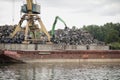 Metal scrapyard on the banks of the Danube river