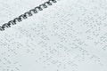 Braille font on paper. Close-up. a book for the blind and visually impaired