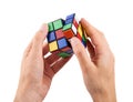 Brain game rubik cube in hand isolated on white background