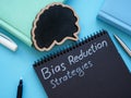 Brain and inscription Bias reduction strategies. Royalty Free Stock Photo