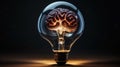 Brain inside of light bulb on black background Royalty Free Stock Photo