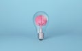 Brain on light bulb on blue background. Concept of inspiration, creativity, idea, innovation Royalty Free Stock Photo