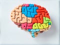 A brain-shaped puzzle composed of wooden blocks.