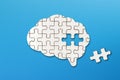 Brain shaped white jigsaw puzzle on blue background, a missing piece of the brain puzzle, mental health and problems with memory Royalty Free Stock Photo