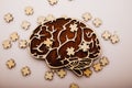 Brain with wooden puzzles. Mental Health and problems with memory