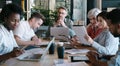 The brainpower behind a winning plan. a group of businesspeople having a meeting in a modern office.