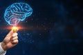 Brainstorm, creative idea and business success concept with digital blue human brain in form of light bulb in man hand on dark Royalty Free Stock Photo