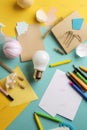 Brainstorming concept with a light bulb and school supplies AI generated