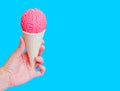 Brainy Delight: Ice Cream Cone with Human Brain Model in Hand