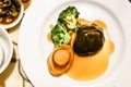Braised abalone with mushroom and broccoli in superior sauce