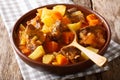 Braised beef Estofado with vegetables close-up on the table. horizontal, rustic Royalty Free Stock Photo