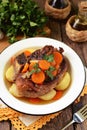 Braised beef with onions and carrots with boiled potatoes. Royalty Free Stock Photo