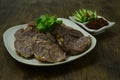 Braised Beef Shank slice ontop corainder thai herb served Galangal chili paste Thai northern Style Royalty Free Stock Photo