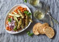 Braised chickpeas in tomato sauce, grilled eggplant and zucchini, white wine, grilled bread - a delicious appetizer or snack. Vege Royalty Free Stock Photo