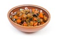 Braised chopped eggplants with other vegetables in clay bowl closeup