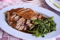 Braised duck meat on plastic plate Royalty Free Stock Photo