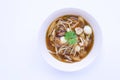 Braised fish maw in red gravy in bowl on white