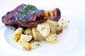 Braised lamb shank with potatoes Royalty Free Stock Photo