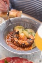 Braised Octopus with Tomato Sauce, Sliced Potato as Side Dish Royalty Free Stock Photo